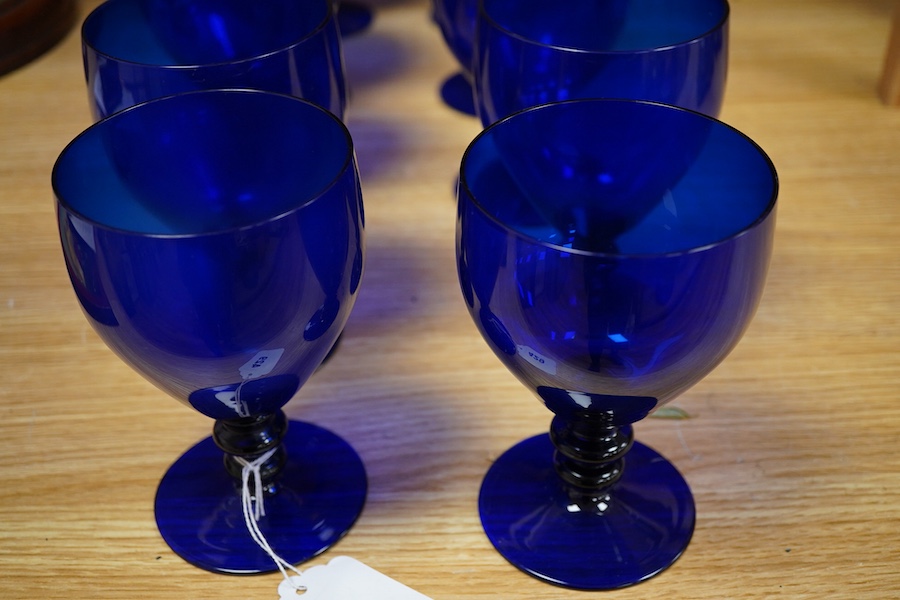 A collection of fourteen Bristol blue glass rummers, largest 15cm high